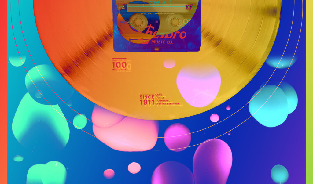 Chesbro Music wallpaper with a gold record and colorful floating bubbles